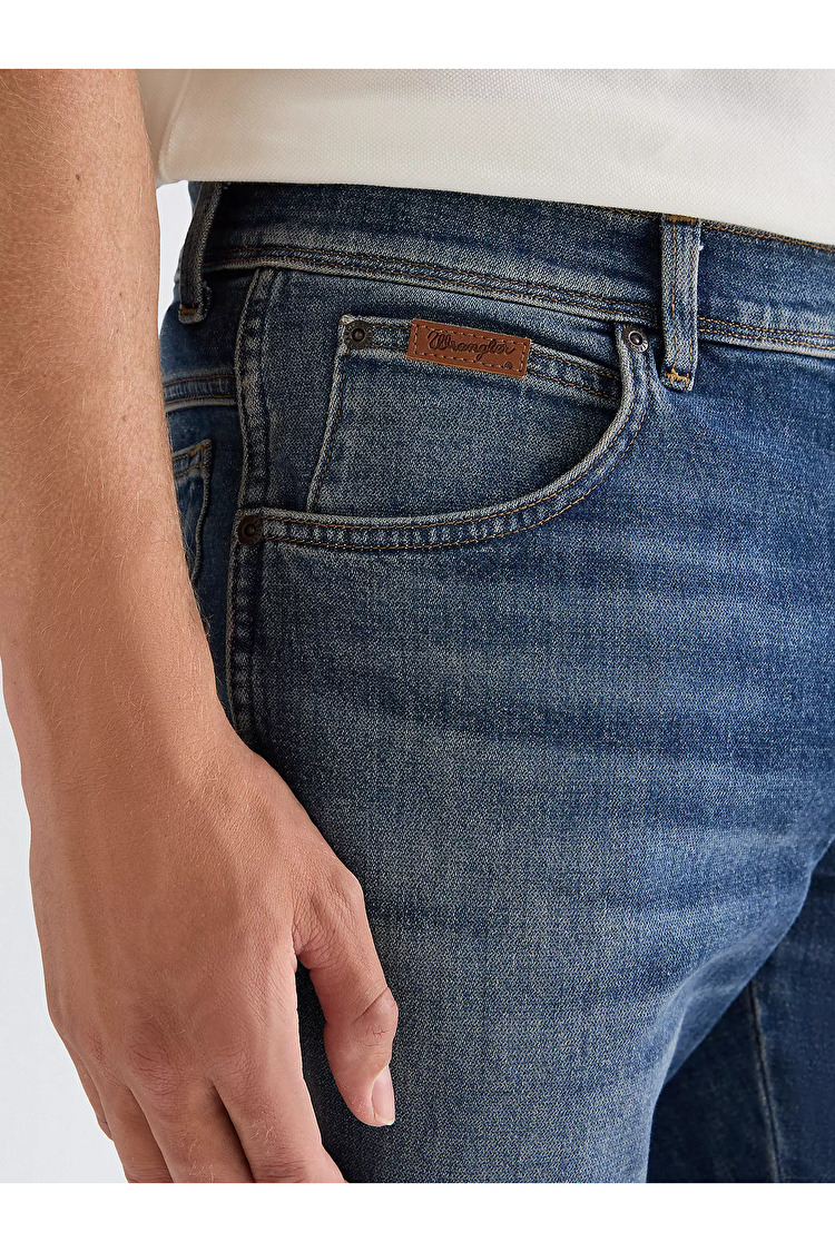 Джинси Wrangler Texas Slim Slim Fit (112377808) Блакитний